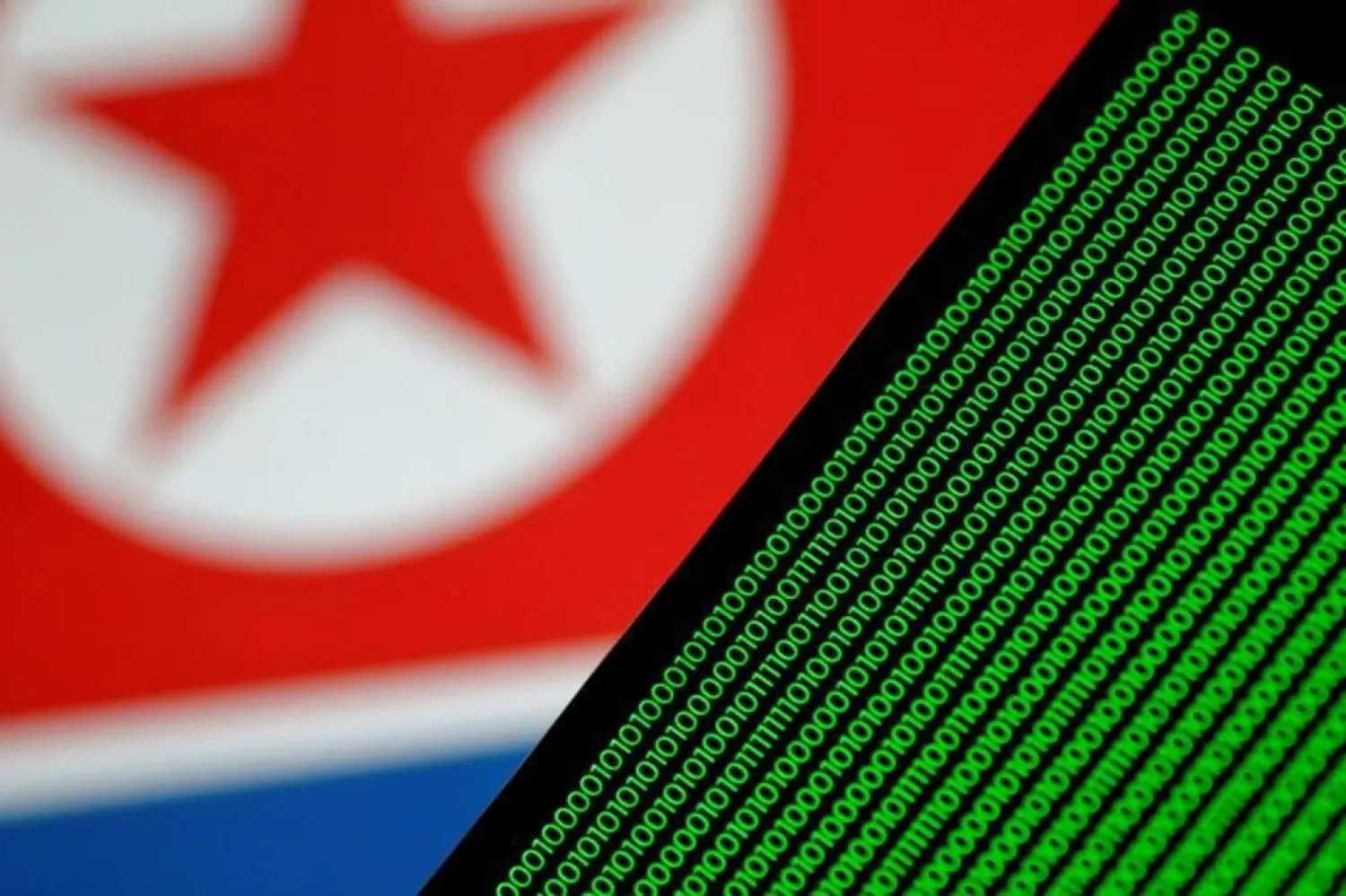 Illustration photo of binary code against a North Korean flag. (Reuters)