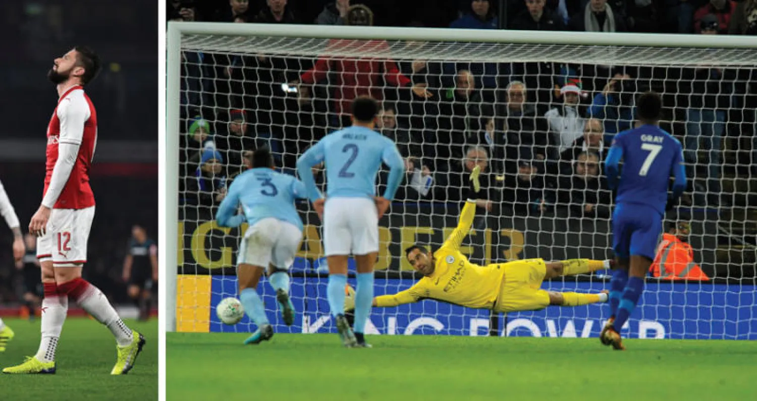 برافو حارس سيتي يتصدى لركلة الترجيح التي سددها محرز لاعب ليستر (أ.ب)  -  جيرو مهاجم آرسنال يخرج مصاباً (رويترز)