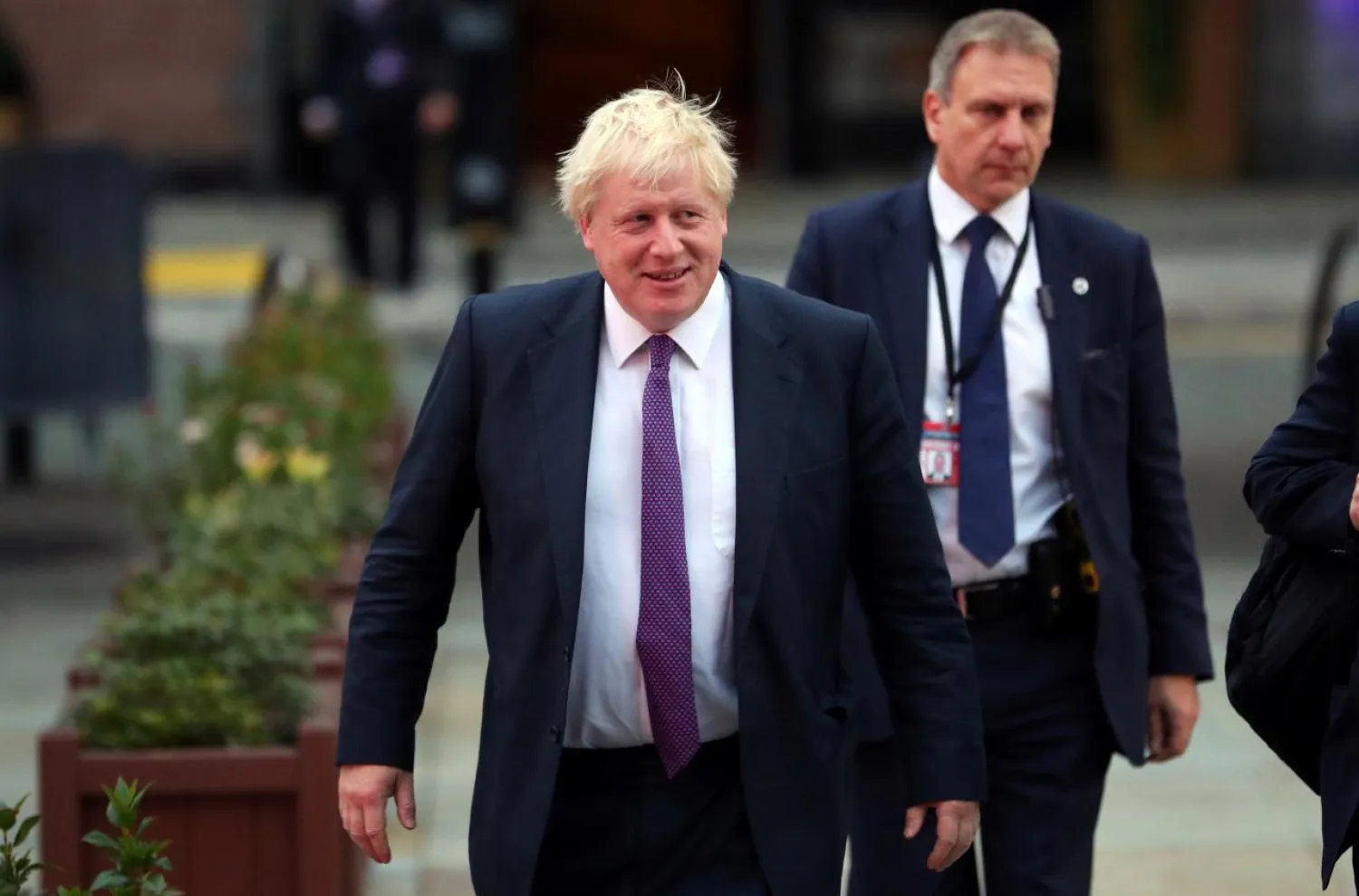 Britain's Foreign Secretary Boris Johnson walks to the main hall on the final day of the Conservative Party Conference in Manchester, Britain October 4, 2017. REUTERS/Hannah McKay
