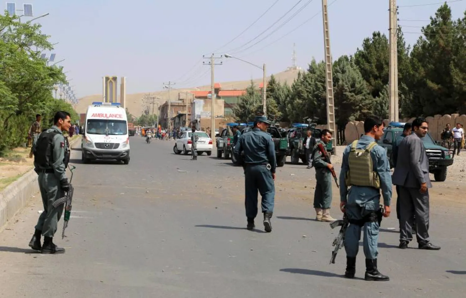 Afghan police soldiers inspect the site of a bomb attack, in Herat, Afghanistan, AP file photo