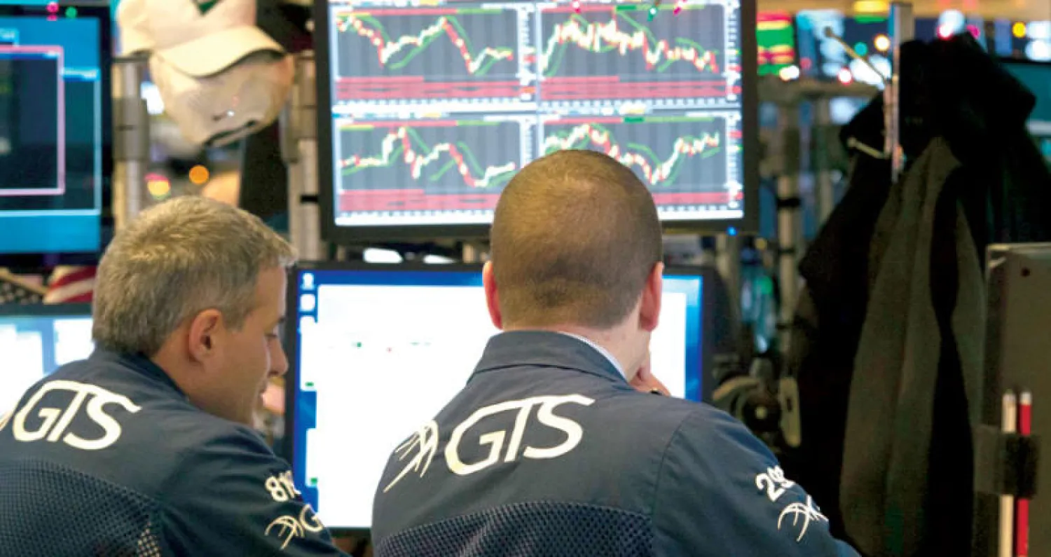 تتحمس الأسواق لقانون ترمب لما سيسهم به من خفض معدل ضرائب أرباح الشركات (أ.ف.ب)