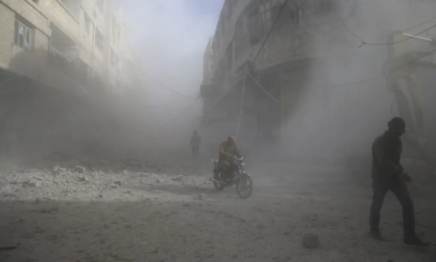  
People are seen during shelling in the town of Hamoria, eastern Ghouta in Damascus, Syria. 
Image: REUTERS/Bassam Khabieh