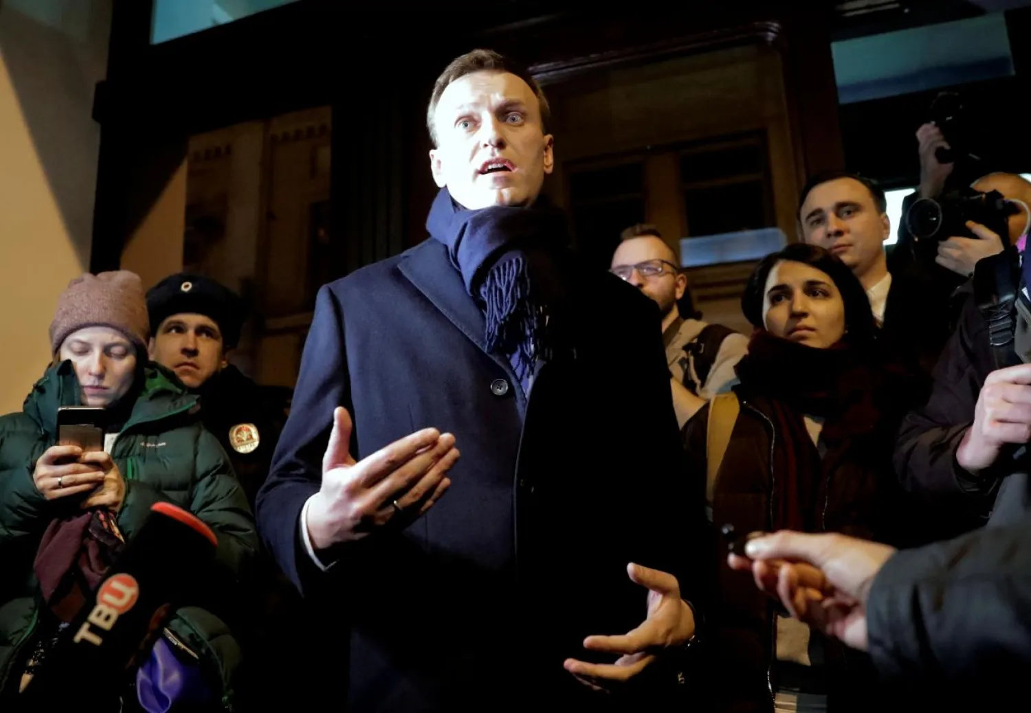 Russian opposition leader Alexei Navalny speaks to the media after submitting his documents to be registered as a presidential candidate at the Central Election Commission in Moscow. (Reuters)