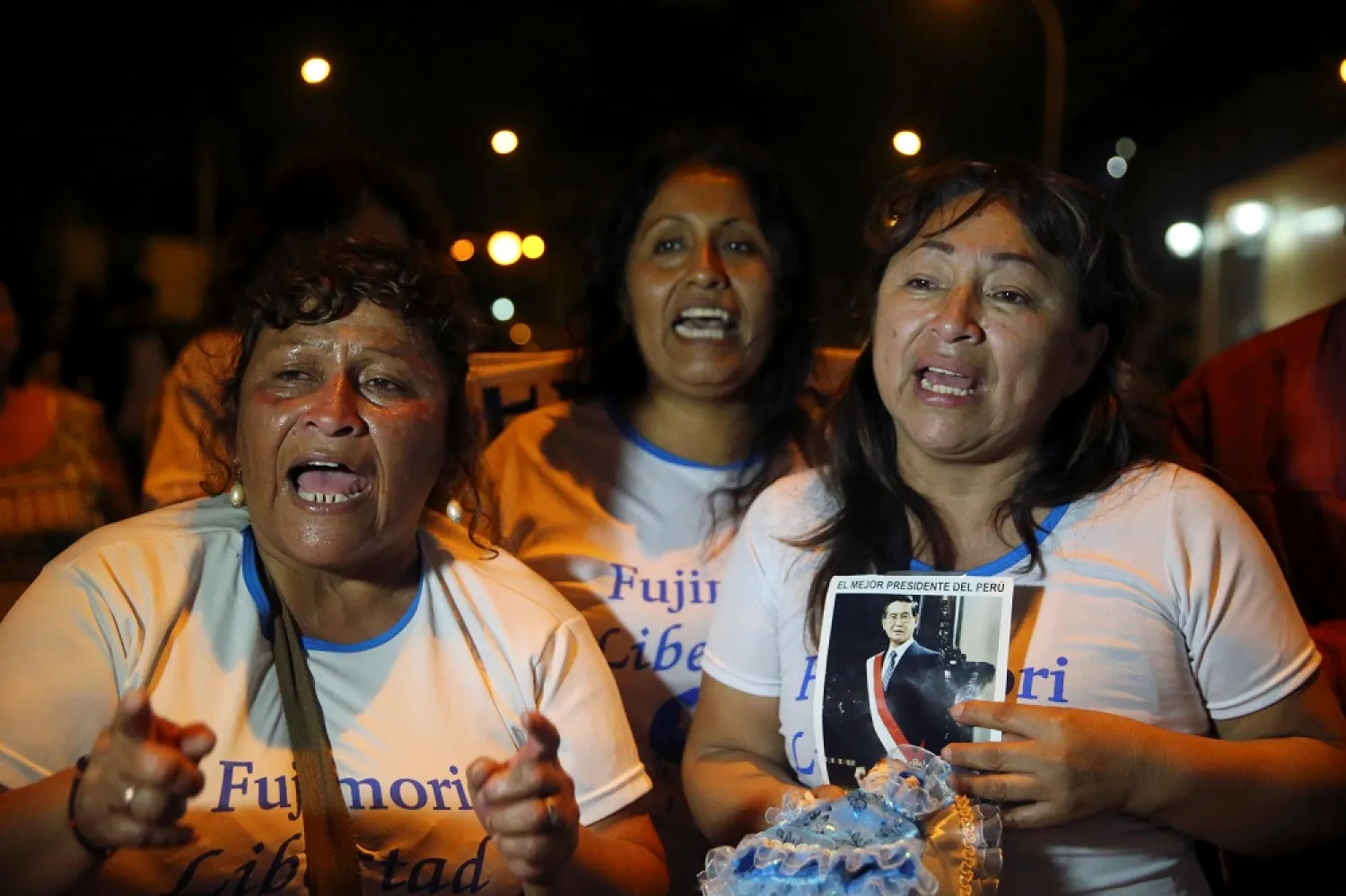 Supporters celebrate after Peruvian President Pedro Pablo Kuczynski pardoned former President Alberto Fujimori who was serving a 25-year prison sentence. (Reuters)