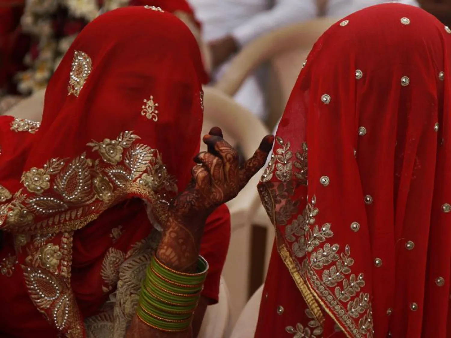 An Indian real estate tycoon funded a mass wedding ceremony that allowed 251 women to get married. (AP)