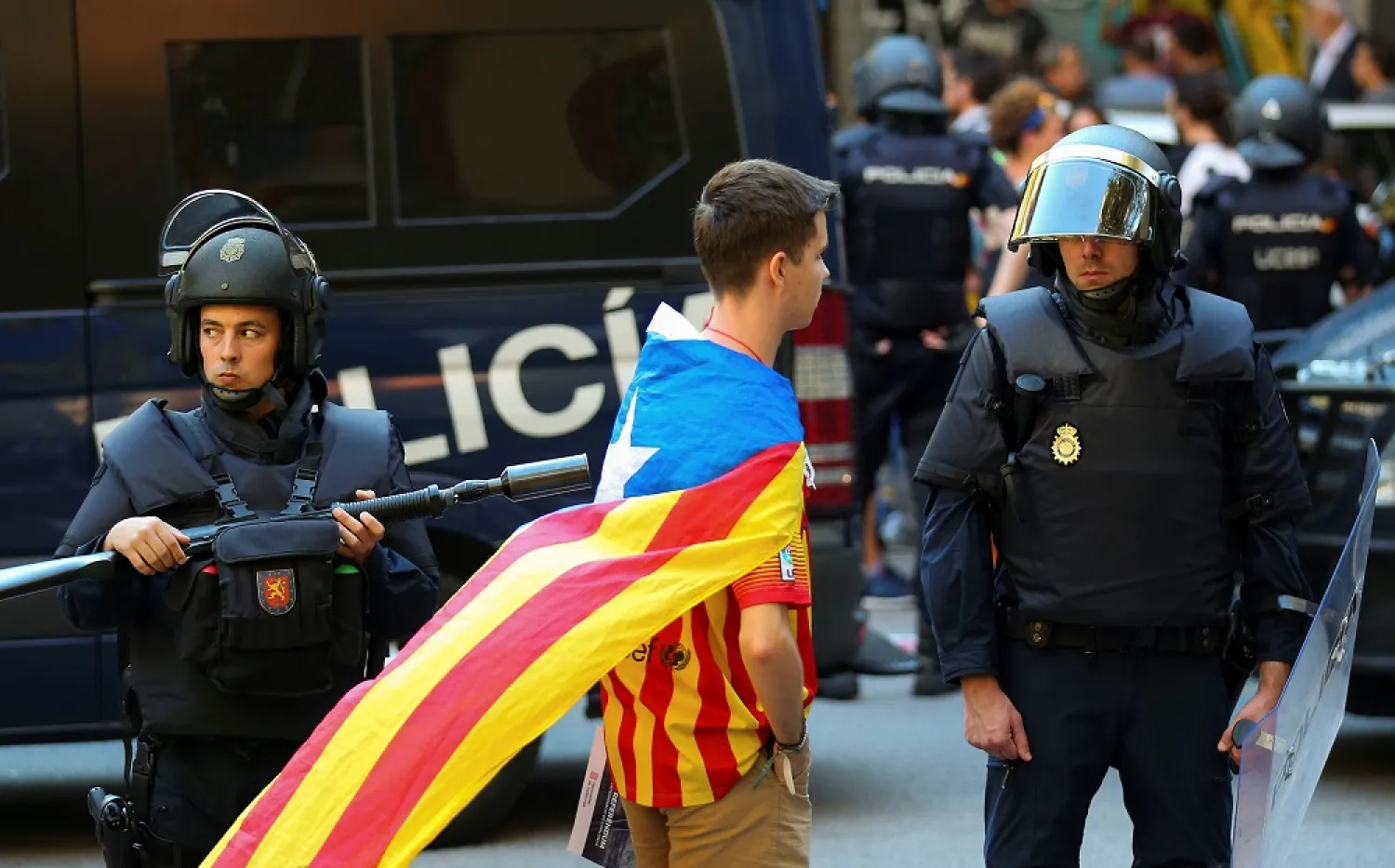 The Spanish Interior Ministry announced that it was withdrawing thousands of police reinforcements from Catalonia following the easing of tensions sparked by the independence referendum. (Reuters)