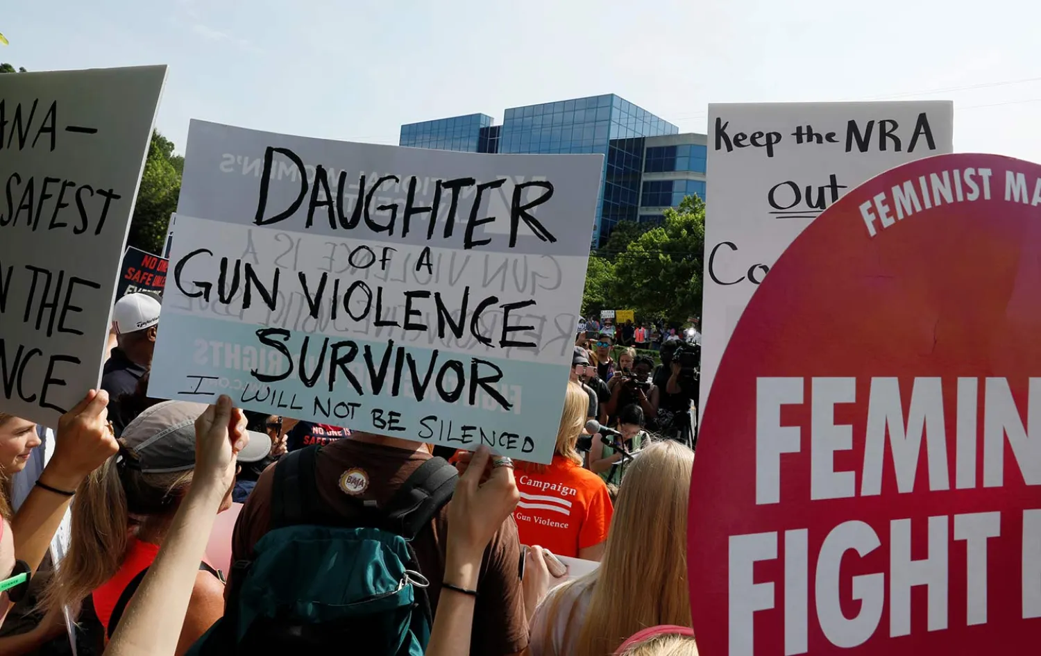 Protesters aligned with the Women’s March rally as they begin a
17-mile march against gun violence from National Rifle Association
(NRA) headquarters in Virginia, July 14, 2017. (Reuters / Jonathan
Ernst)