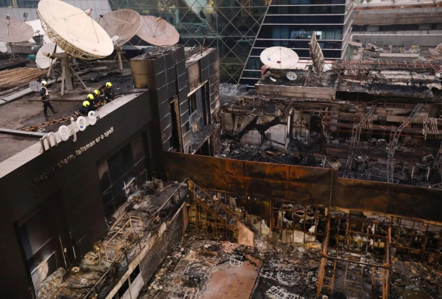 Fire fighters inspect the restaurants destroyed in a fire in Mumbai, India, December 28, 2017. REUTERS/Danish Siddiqui