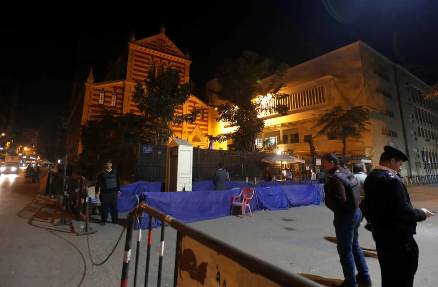 Police and security guard outside Saint Joseph's Roman Catholic Church in the capital of Cairo, Egypt December 24. Reuters 
