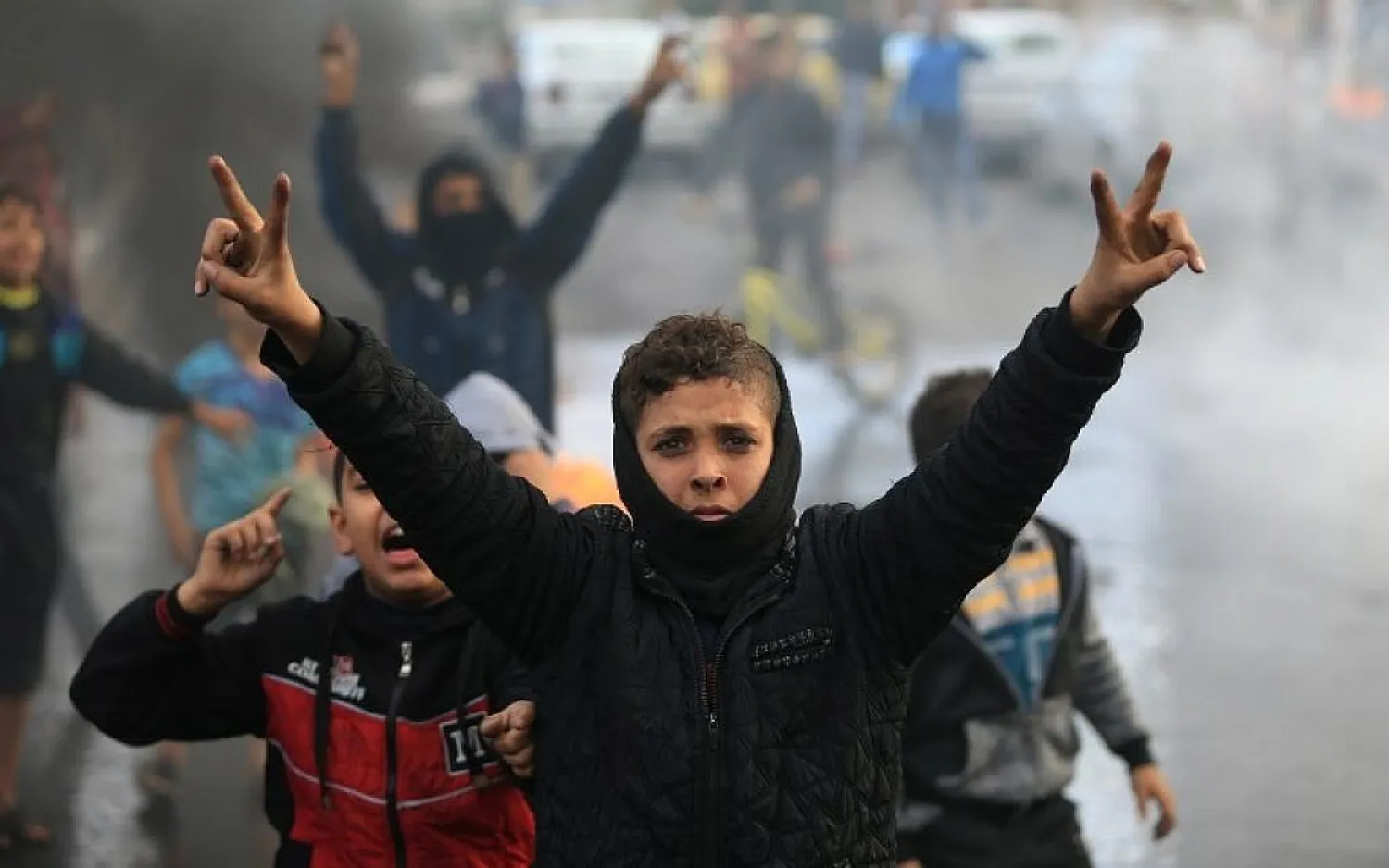 Palestinians take part in a protest against US President Donald Trump's decision to recognize Jerusalem as the capital of Israel, in Gaza City, December 7, 2017. (MOHAMMED ABED/AFP)