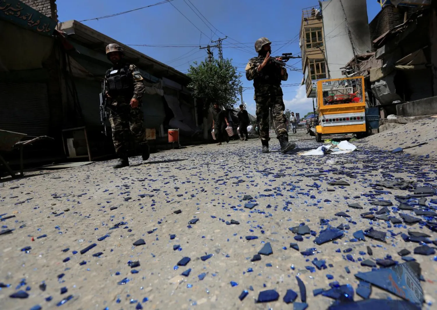 Afghan security forces keep guard after an attack in Jalalabad, Afghanistan. (Reuters)