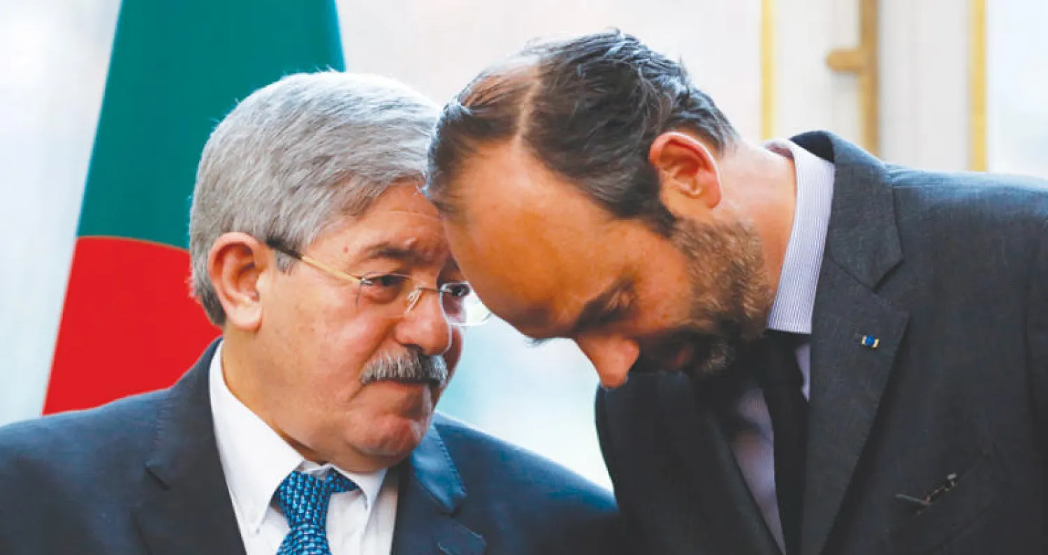 رئيس الوزراء الجزائري أحمد أويحيى ونظيره الفرنسي إدوار فيليب في باريس الشهر الماضي (أ.ف.ب)