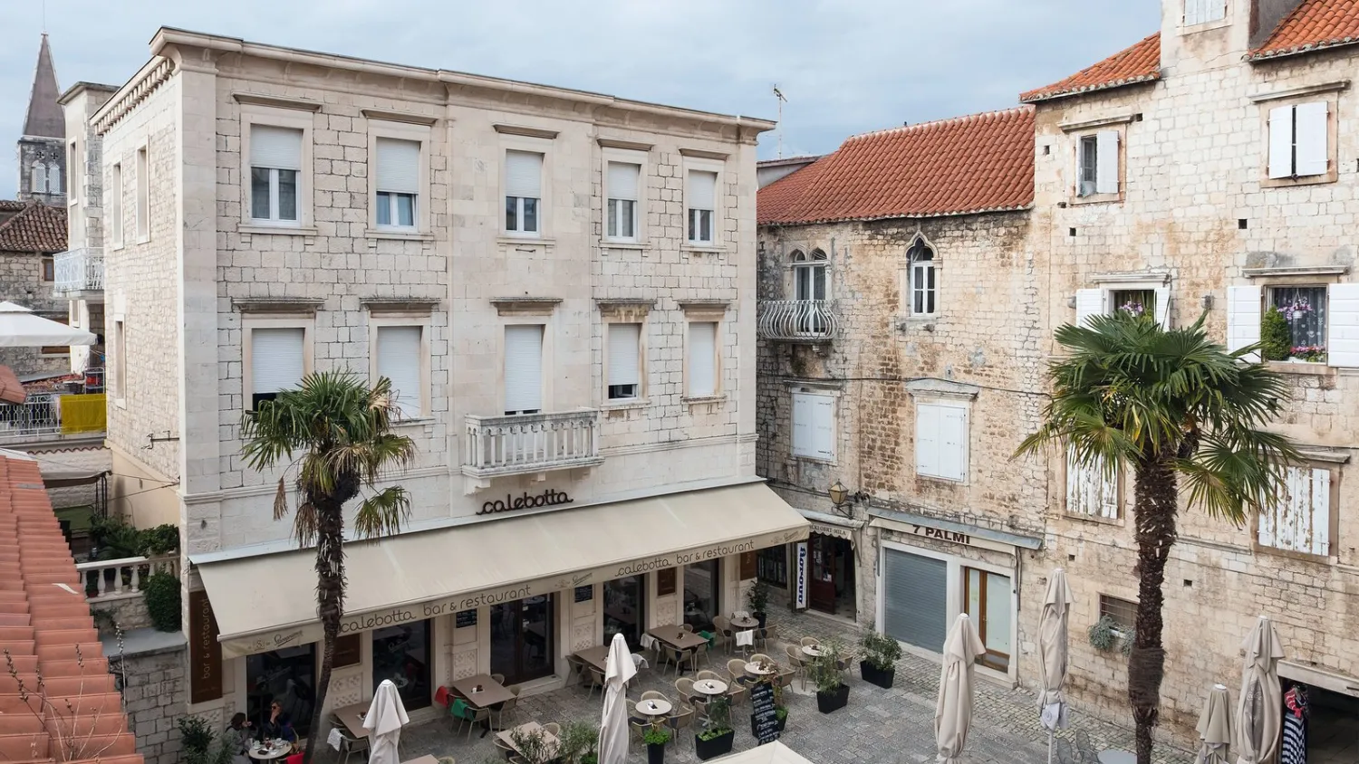 A three-bedroom apartment on the second floor of a traditional Dalmatian stone house built in 1928 in Trogir, Croatia, is on the market for about $2.1 million.Credit: Zoran Marinovic for The New York Times