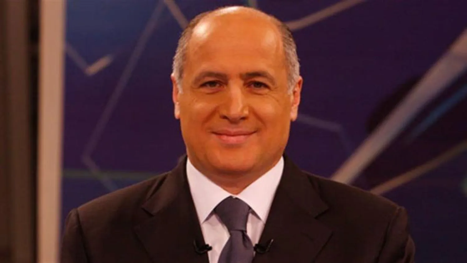 الإعلامي اللبناني مارسيل غانم (الوكالة الوطنية للإعلام)