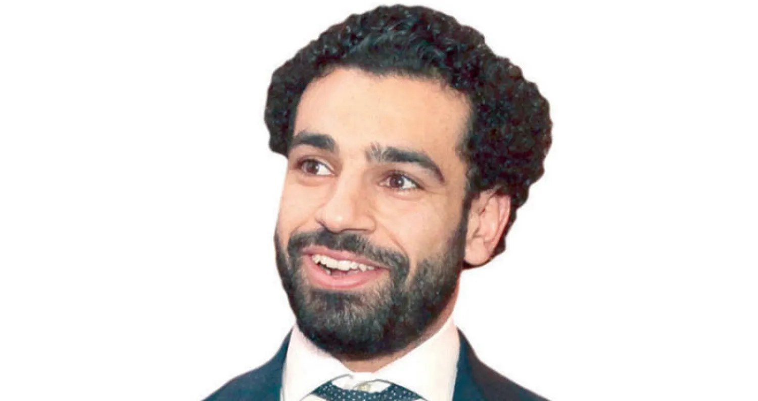 صلاح خلال حفل التتويج (إ.ب.أ)