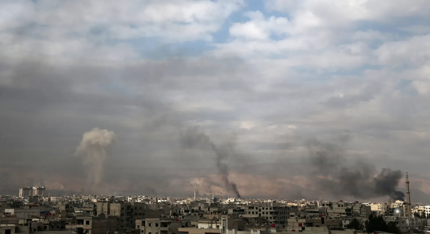 Smoke billows following an airstrike on Eastern Ghouta on the outskirts of the capital Damascus. (AFP)