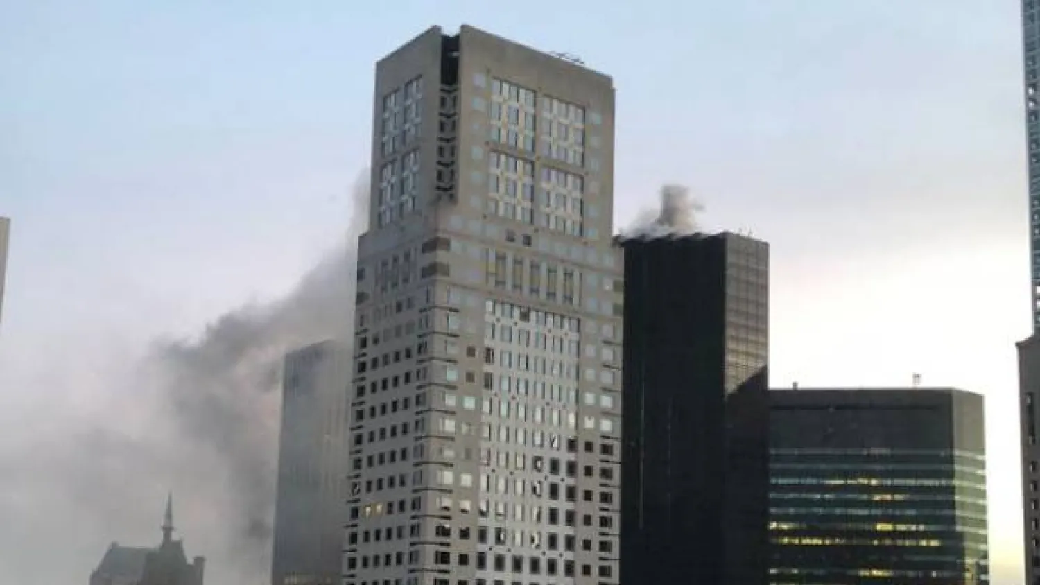 Smoke was seen at the top of the Trump Tower. (Photo: Twitter/@nycpov) 