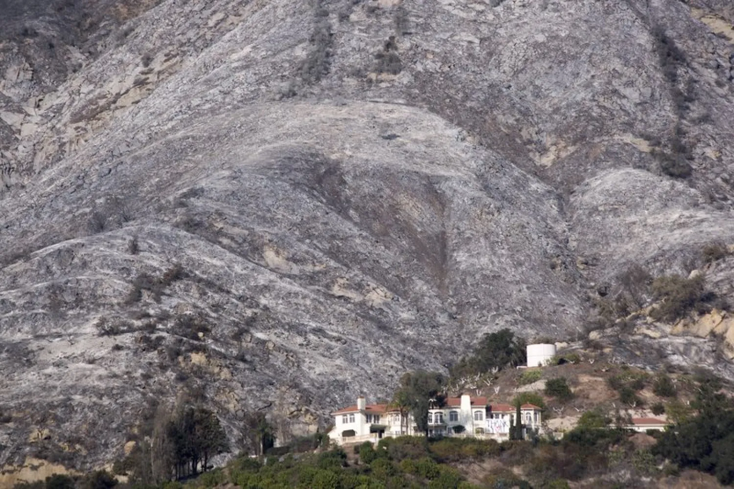 Ashen hillsides that were burned in burned in the Thomas Fire take on a nearly winter-like appearance on December 20, 2017 near Carpinteria, California. (Getty Images)