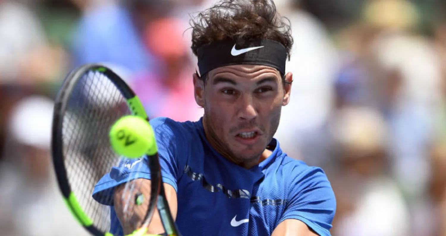 نادال اختبر لياقته في مباراة استعراضية في كويونغ (أ.ف.ب)