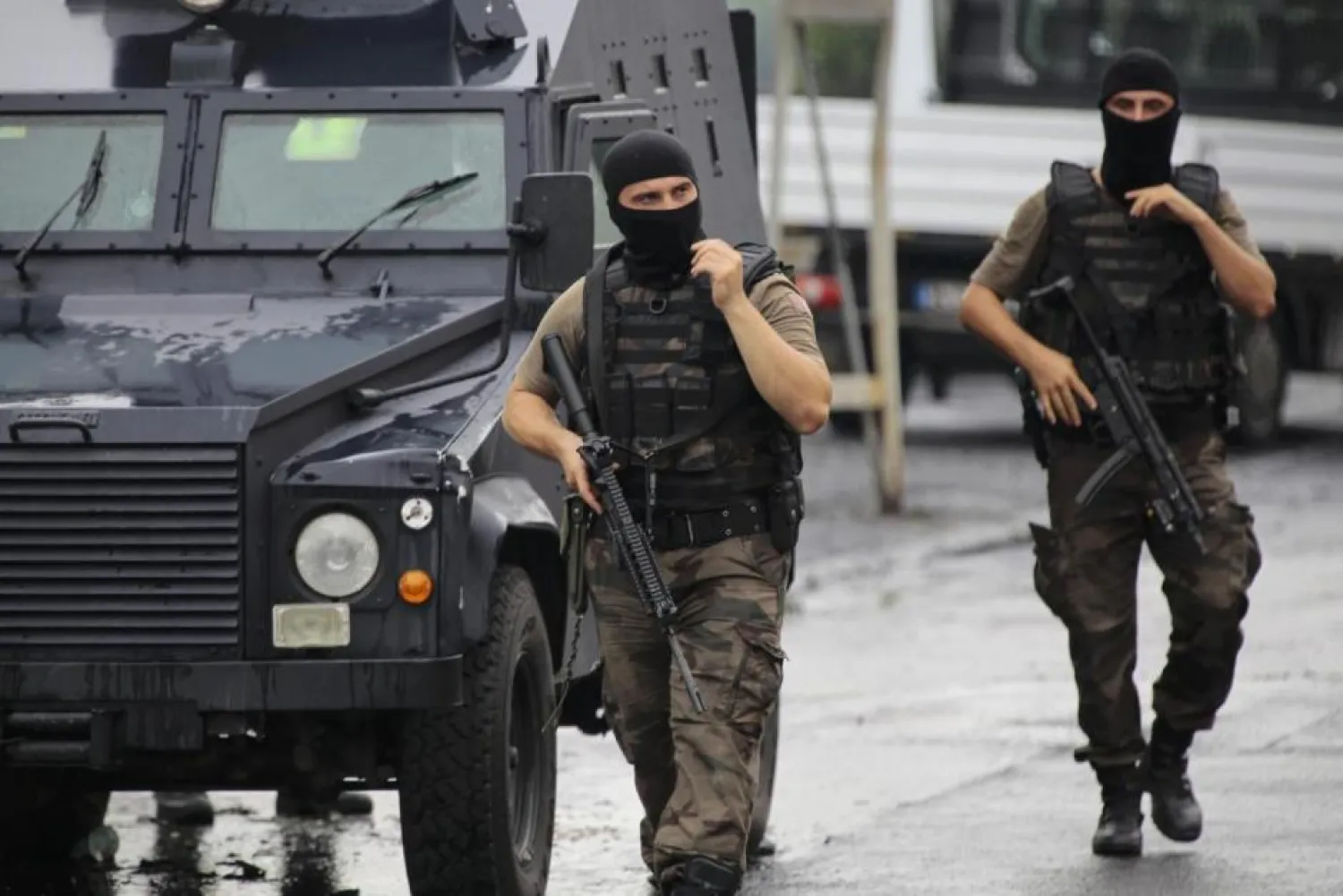 Two members of the police special forces patrol outside a police station in Istanbul, Turkey. (Reuters)