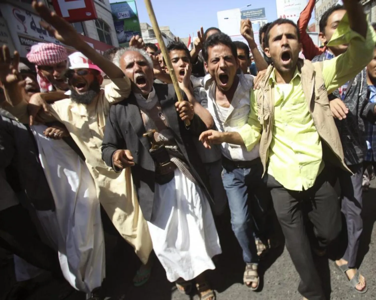 Anti-Houthi protesters shout slogans during a demonstration against the militia in the southwestern city of Taiz, Yemen. (Reuters)