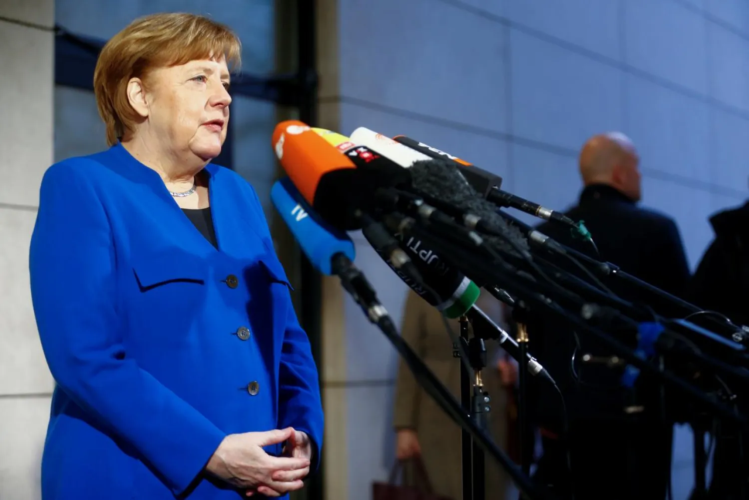 German Chancellor Angela Merkel reached a preliminary deal with her Social Democrat (SPD) rivals that will pave the way for government coalition talks. (Reuters) 