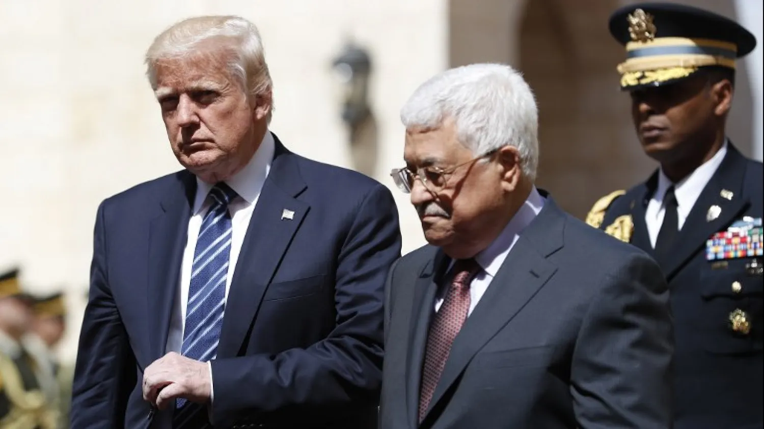 US President Donald Trump (L) is welcomed by Palestinian Authority President Mahmoud Abbas at the presidential palace in the West Bank city of Bethlehem on May 23, 2017. (Thomas Coex/AFP)