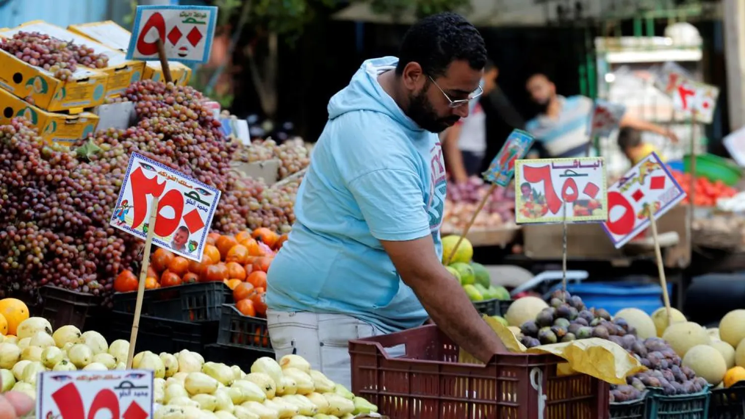 A trader waits for customers at a market in Abbdien square in Cairo, Egypt. (Reuters)