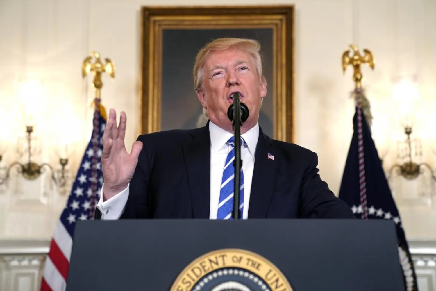US President Donald Trump speaks about his trip to Asia in the Diplomatic Room of the White House in Washington, US, November 15, 2017. REUTERS/Joshua Roberts 