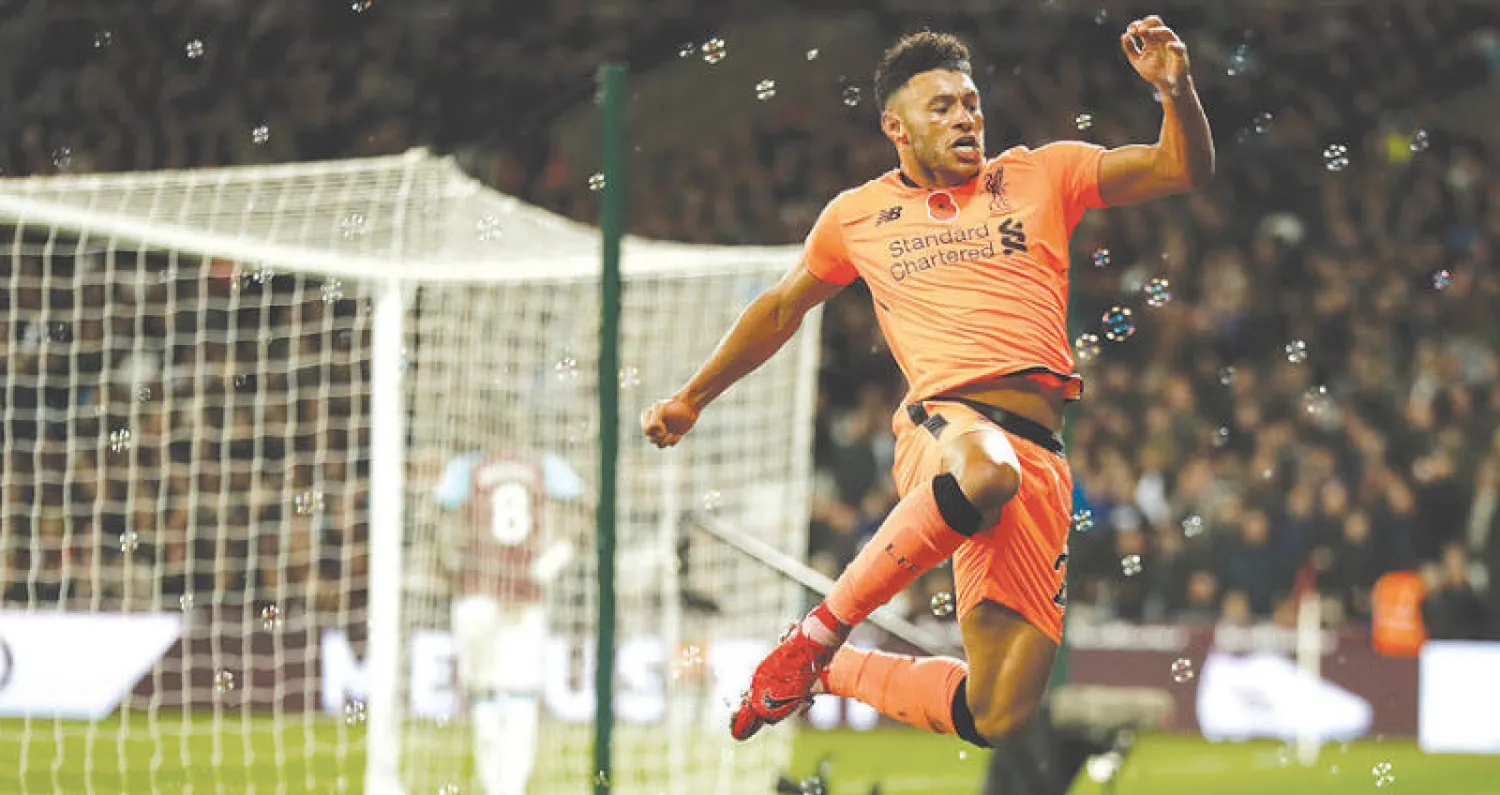 تشامبرلين يأمل تعويض مكان كوتينيو في ليفربول (أ.ب)