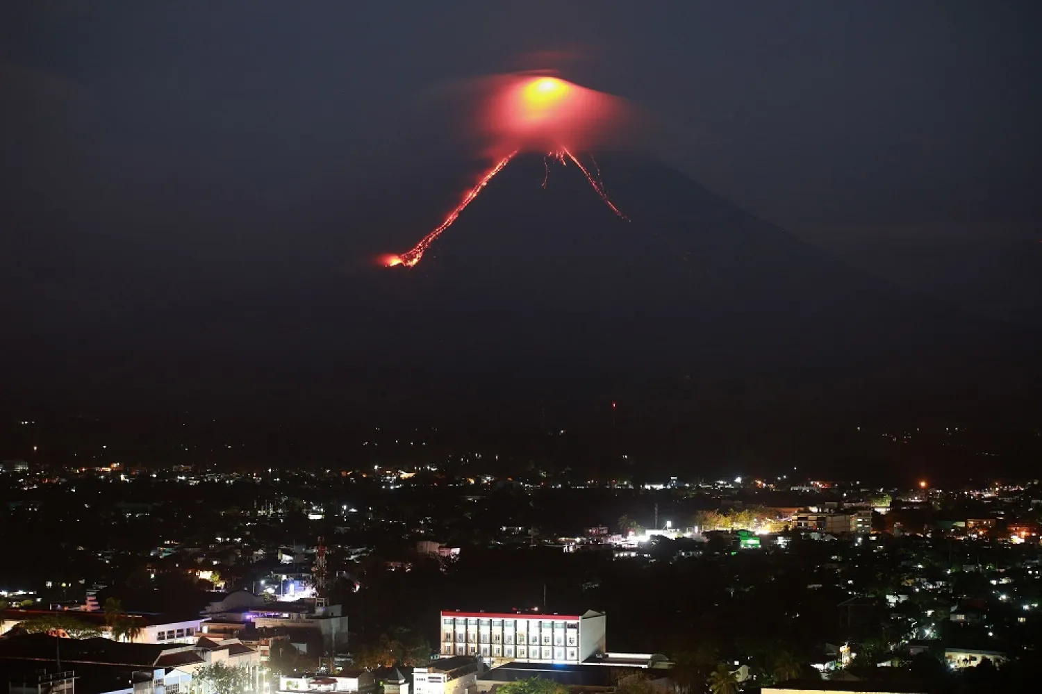 Lava from the Mayon volcano erupts in Legazpi, the Philippines on January 15, 2018. (AFP)