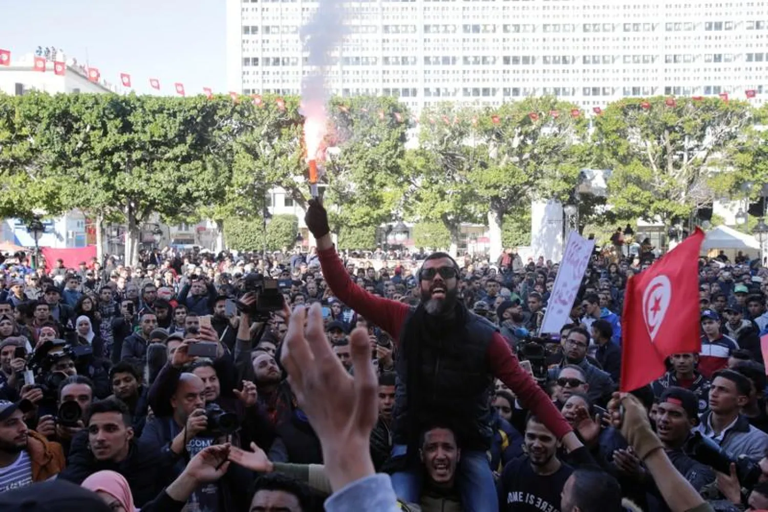 People shout slogans during demonstrations on the seventh anniversary of the toppling of president Zine El-Abidine Ben Ali, in Tunis, Tunisia January 14, 2018. REUTERS/Youssef Boudlal