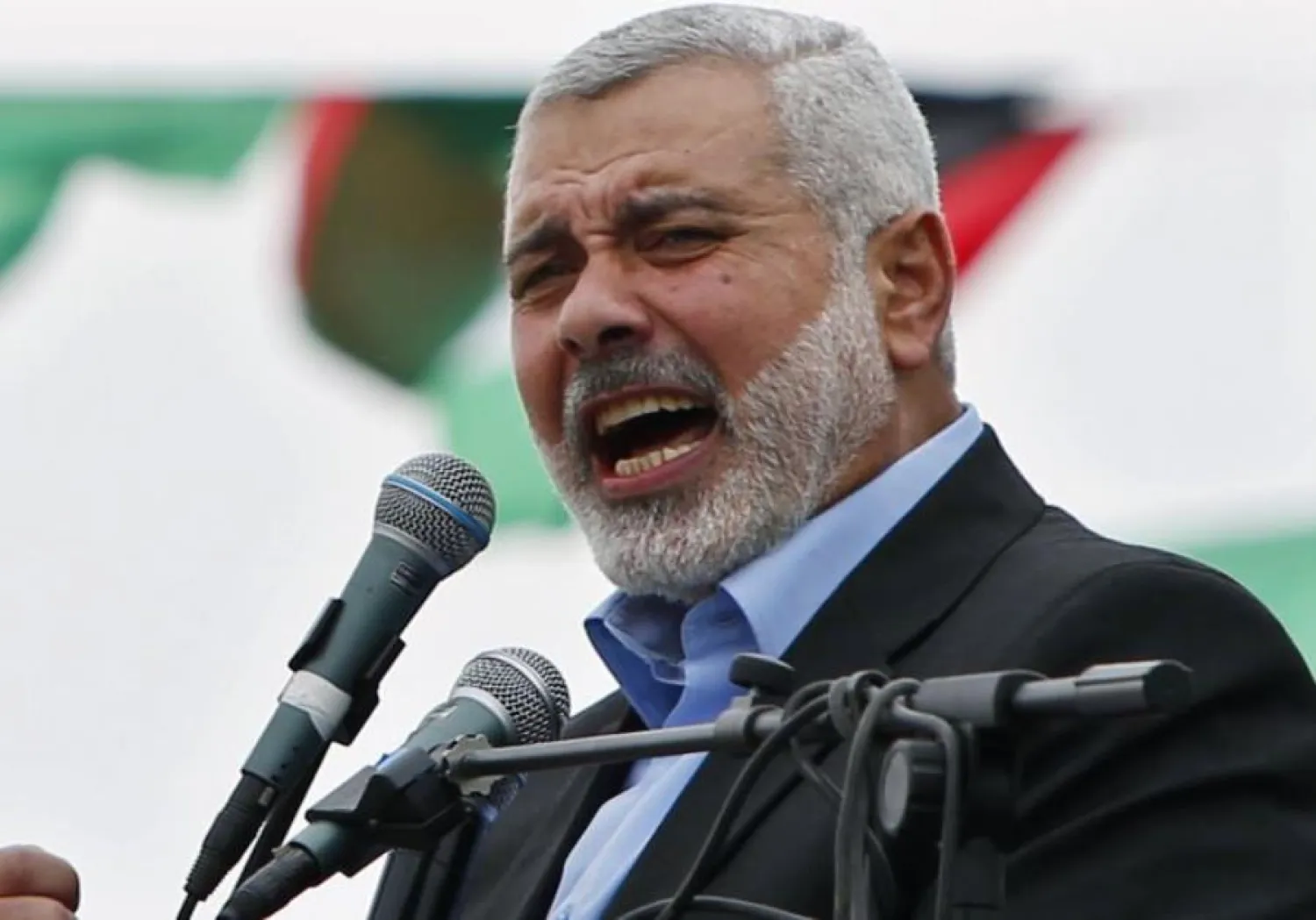 Ismail Haniyeh talks to his supporters during a Hamas rally in Gaza City. (photo credit: REUTERS)