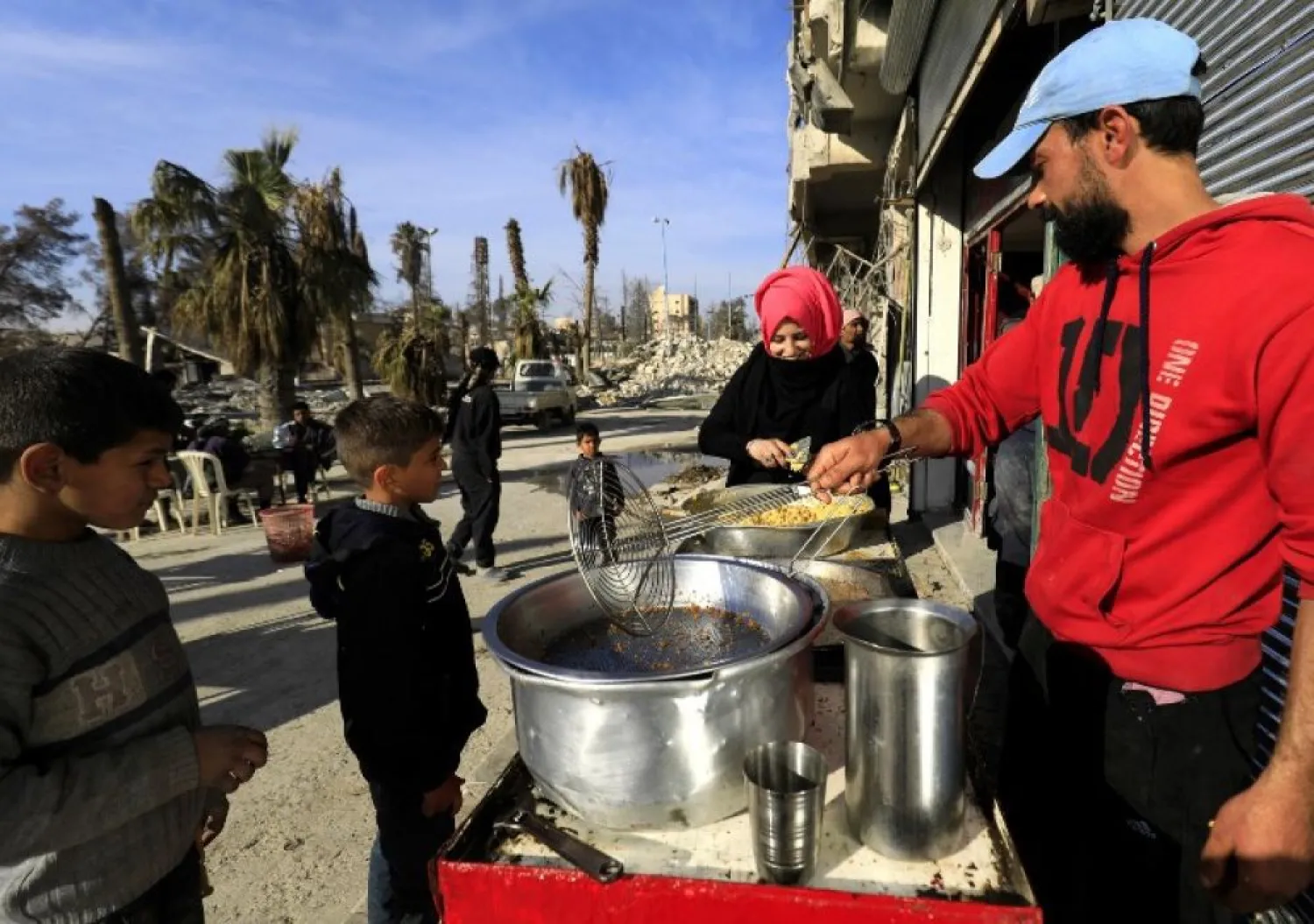 Syrians flock to the King Falafel shop in Raqqa. (AFP)