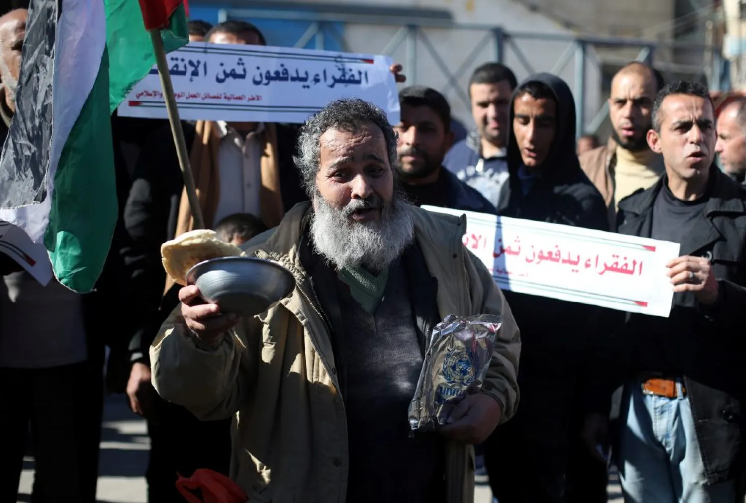 Palestinians protest, calling for better living conditions, outside the United Nations Relief and Works Agency (UNRWA) office, in Rafah in the southern Gaza Strip. (Reuters/Ibraheem Abu Mustafa)