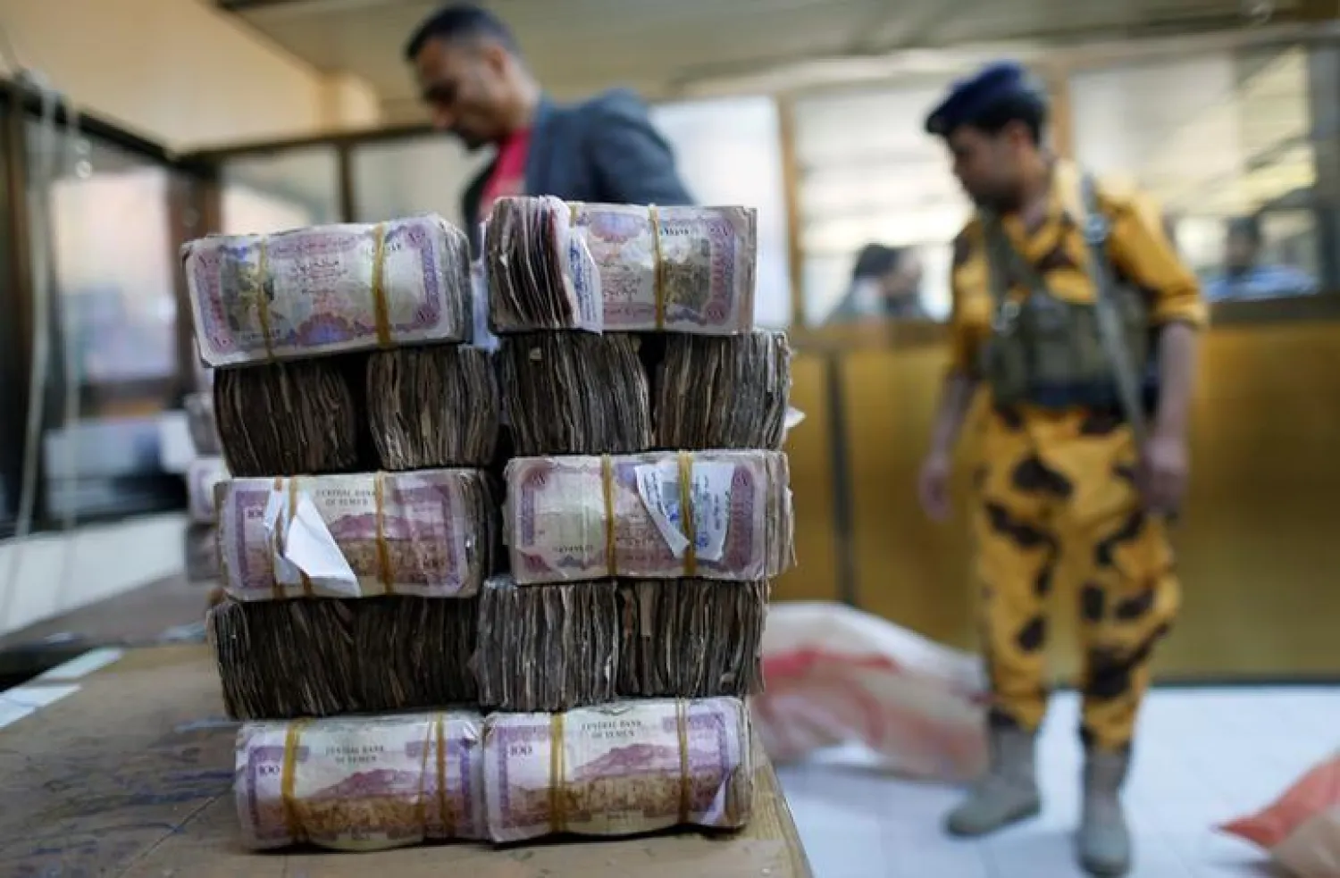  Bundles of Yemeni currency are pictured at a post office before being handed to public sector employees as salaries in Sanaa, Yemen January 25, 2017. REUTERS/Khaled Abdullah/File Photo
