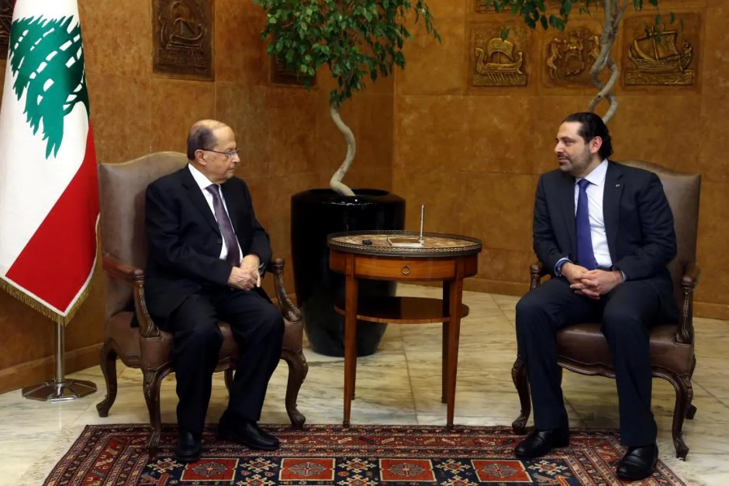 Lebanon's President Michel Aoun (L) meets with Prime Minister Saad al-Hariri at the Presidential Palace in Baabda, Lebanon April 12, 2017 (Dalati & Nohra/ Handout via Reuters) 