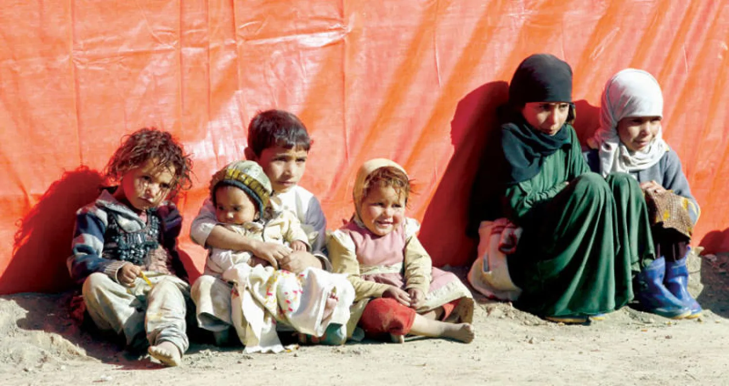 نازحون يمنيون في مخيم بعمران (إ.ب.أ)