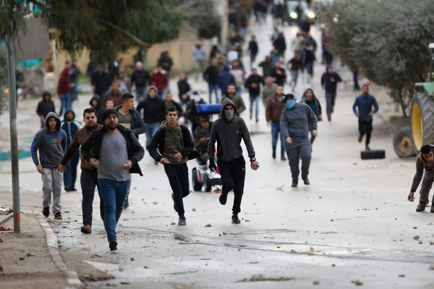 Palestinians clash with Israeli troops in the West Bank city of Jenin on January 18, 2018. Majdi Mohammed/AP 
