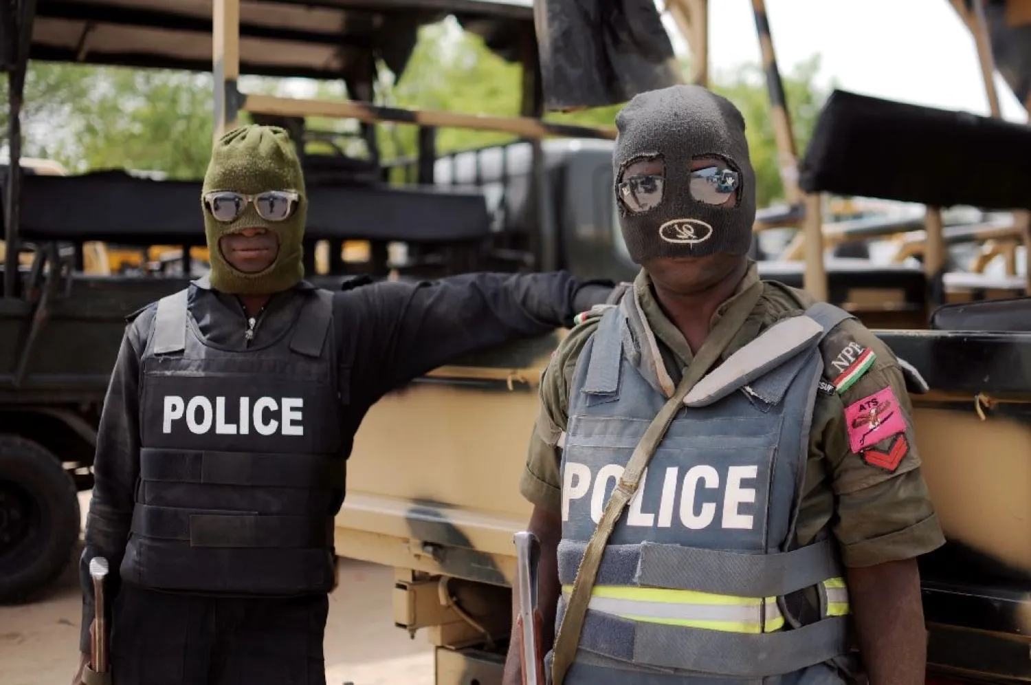 Nigerian police in Borno state pose prior to a patrol in Maiduguri on June 5, 2013 (AFP Photo/Quentin Leboucher)