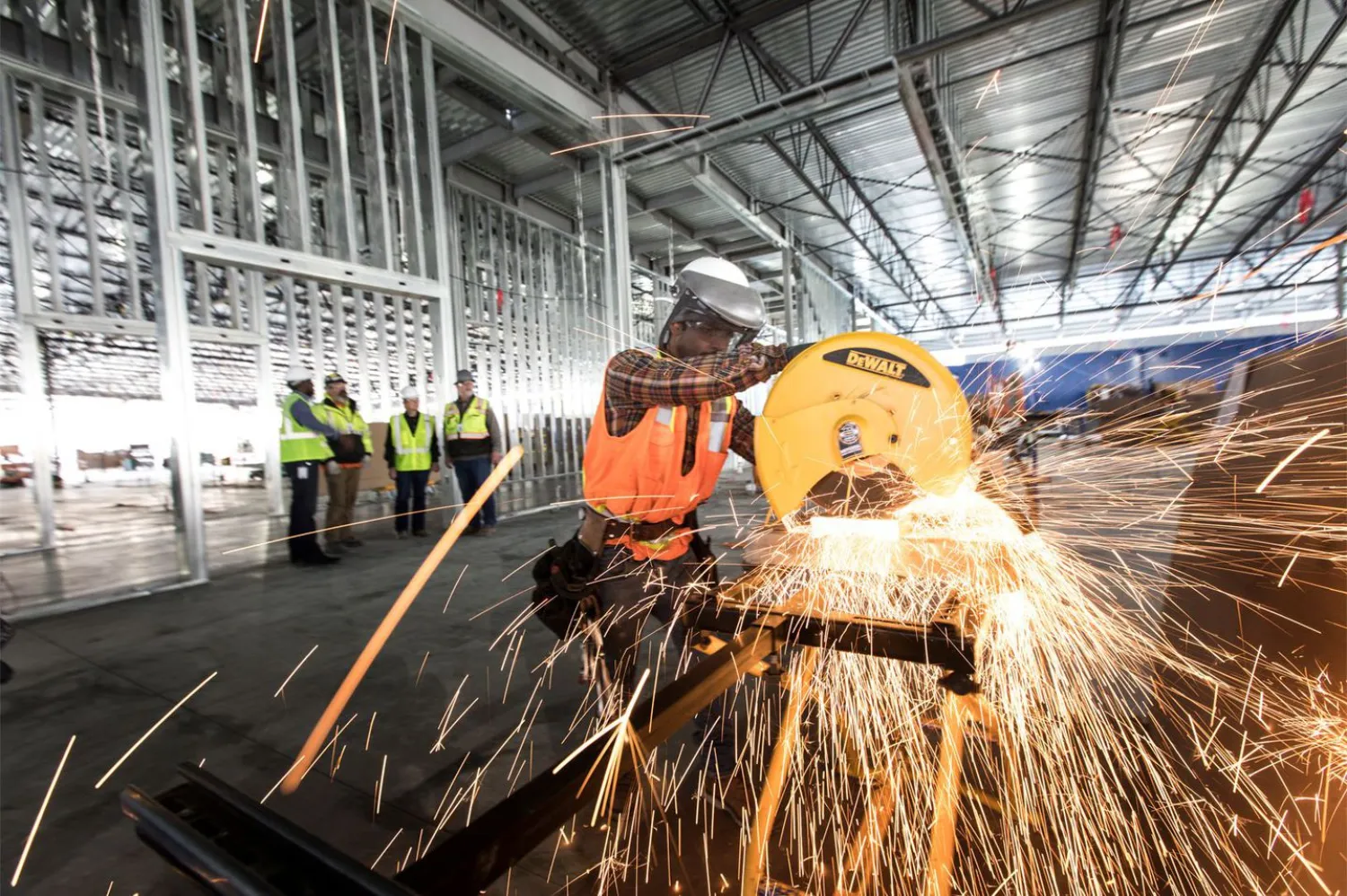 Apple plans to build several new facilities in the United States. Here material is being cut for Apple’s new project in Reno, Nev. (Apple) 