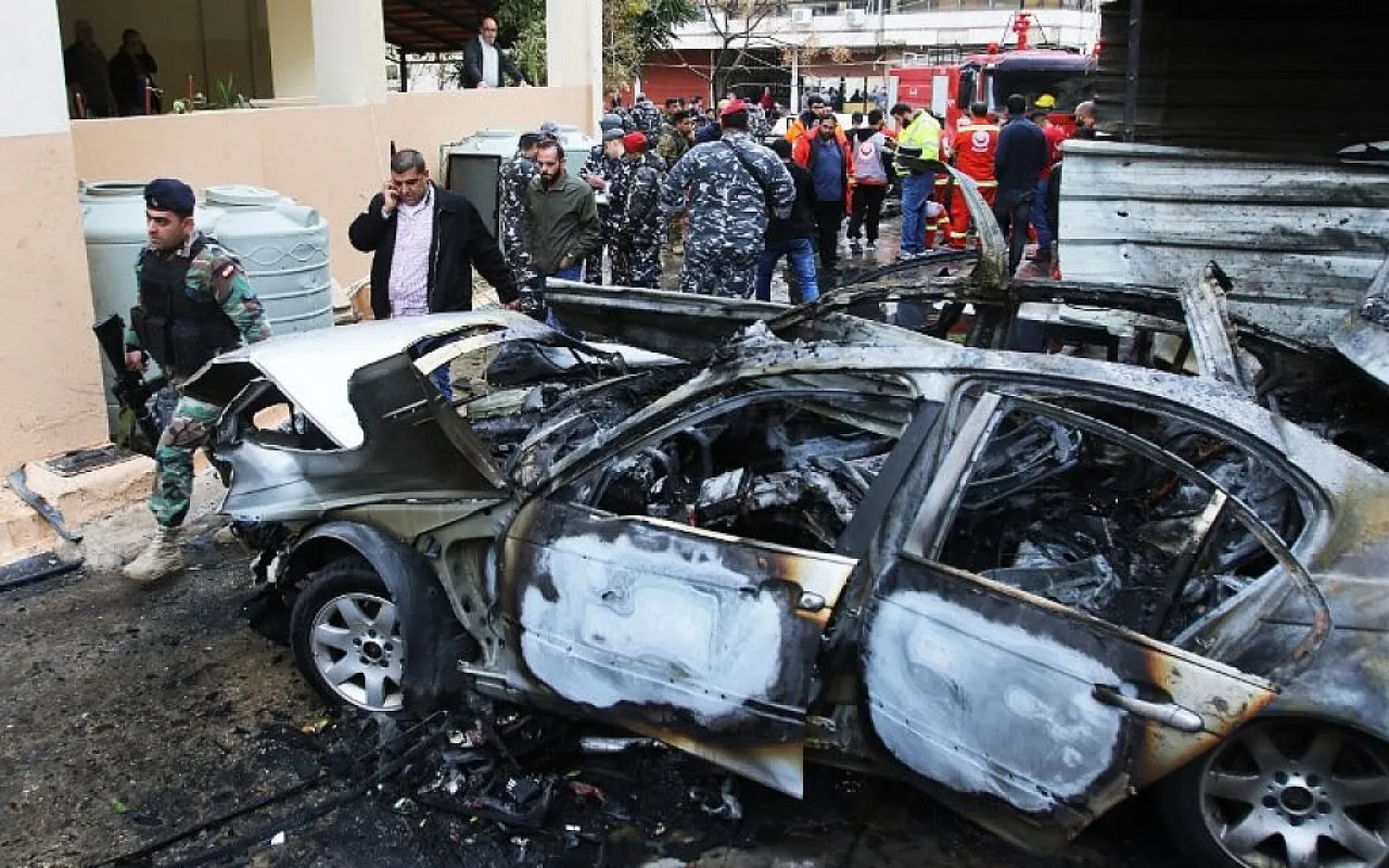Lebanese security forces secure the area following a car bomb blast targeting Hamas official Mohammed Hamdan in the city of Sidon on January 14, 2018. (AFP)
