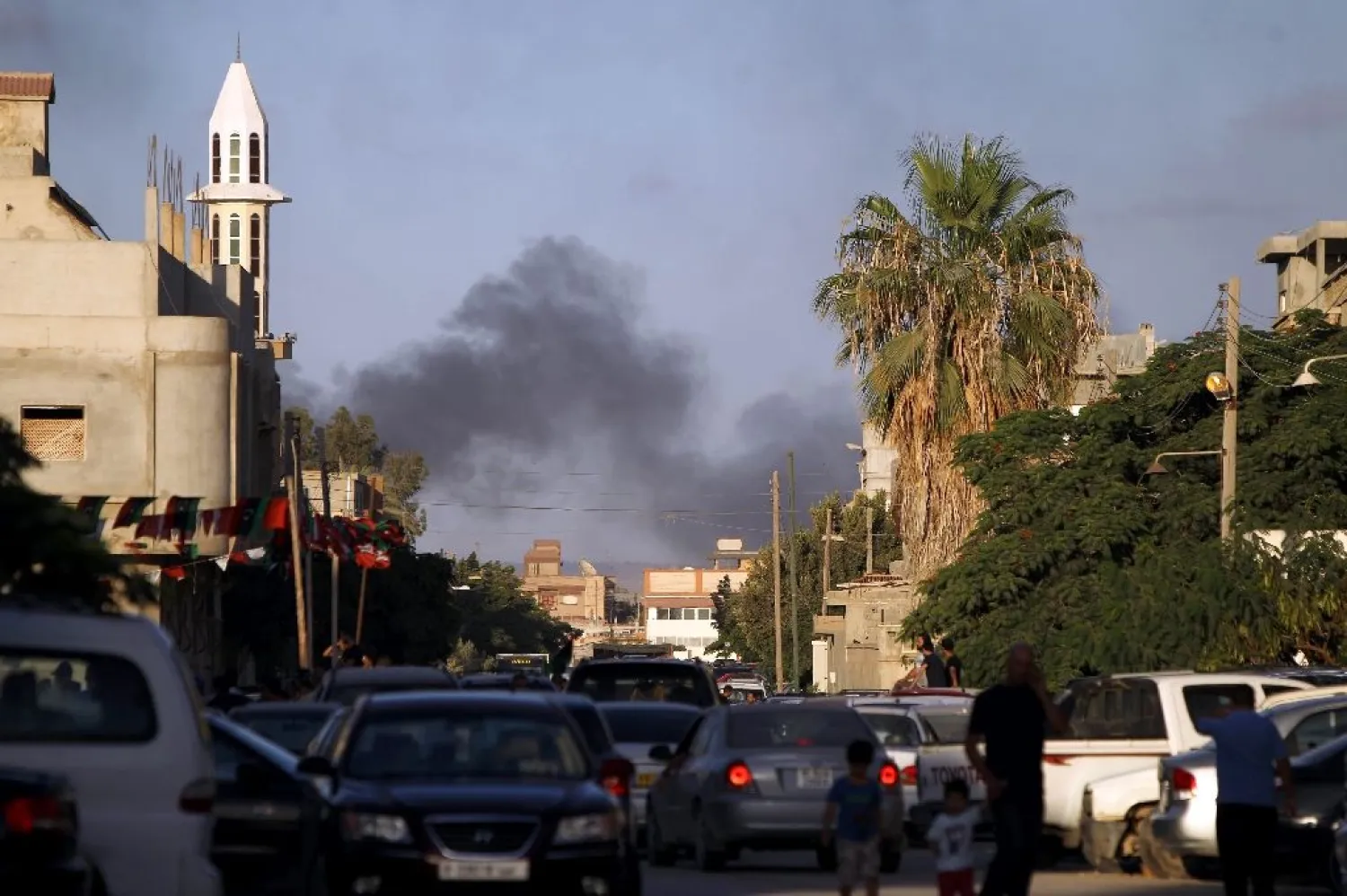 Smoke billows during clashes on July 23, 2014, in the eastern Libyan city of Benghazi. (AFP Photo/Abdullah Doma)