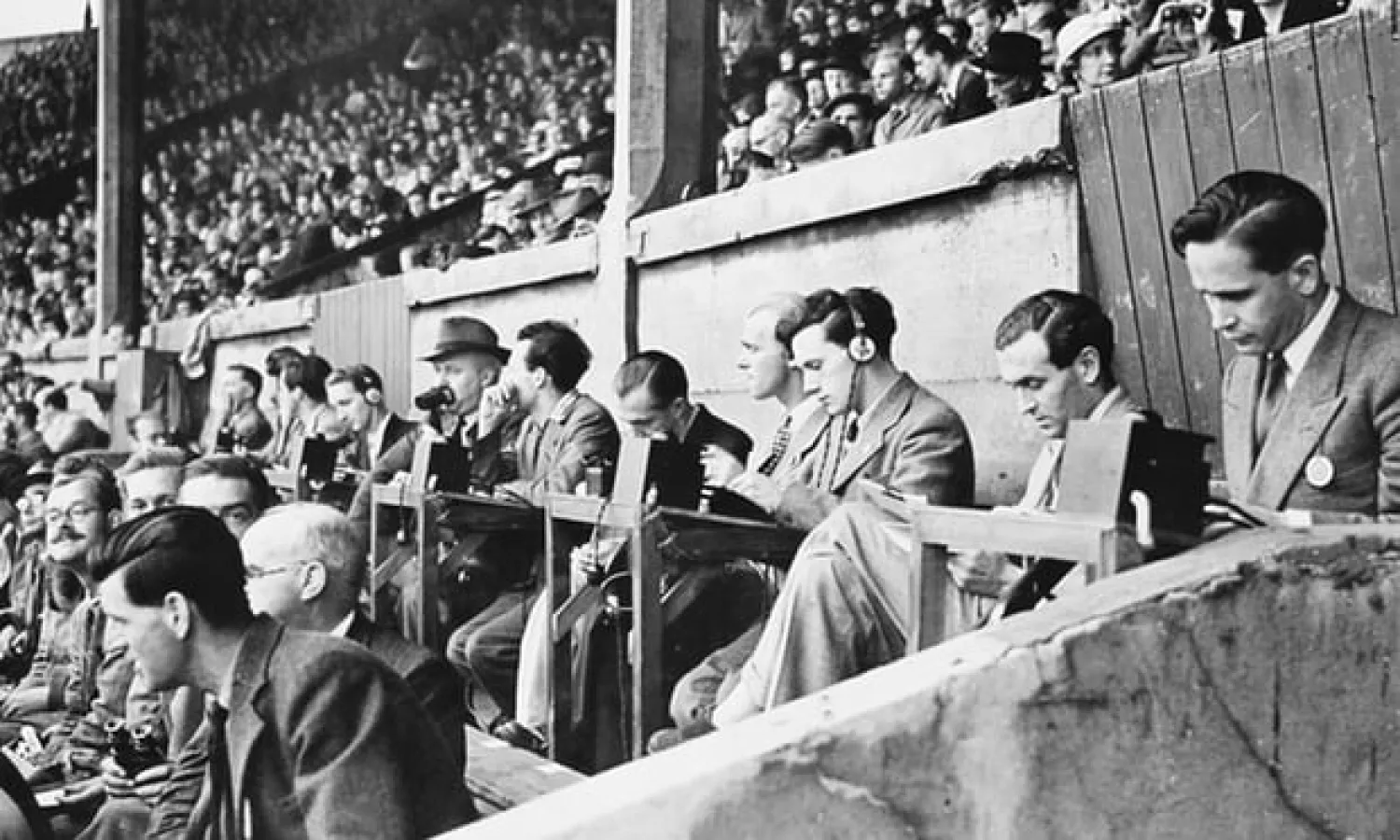  Radio commentators in the stands at Wembley in 1948. Photograph: Topical Press Agency/Getty Images
