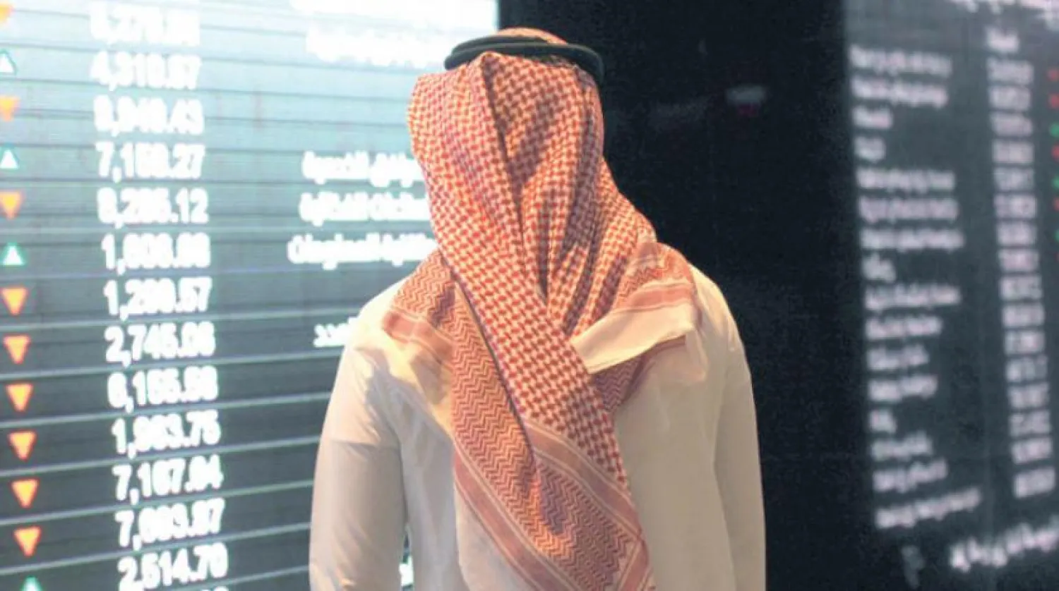 A trader follows the movement of shares (Reuters)