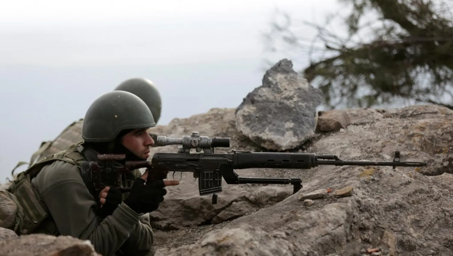 Turkish forces are seen on Mount Barsaya in northeast of Afrin, Syria, Sunday. (Reuters)