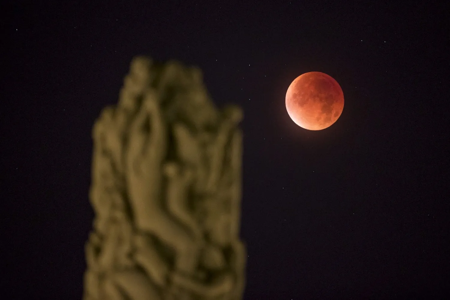 A super moon eclipse of the closest full moon of the year is seen from Vigeland Park in Oslo, Norway in 2015. (Reuters)