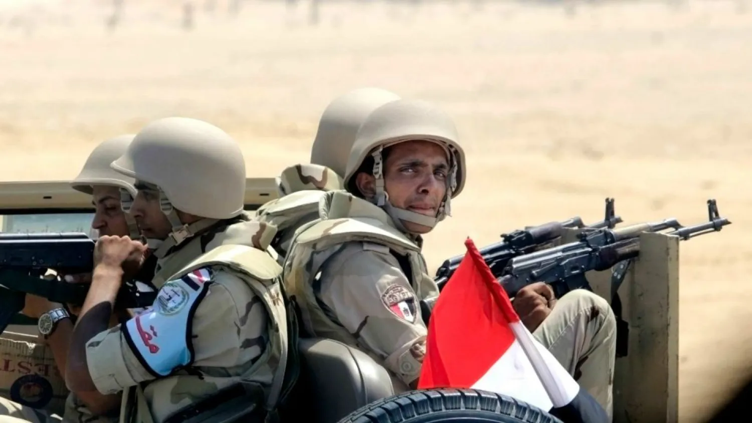 Egyptian army soldiers patrol the Cairo-Ismailia desert road in Egypt, Thursday, Aug. 6, 2015. (AP Photo/Amr Nabil) 