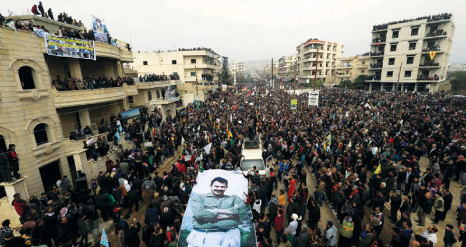 مظاهرة في مدينة عفرين الكردية شمال سوريا ضد القصف التركي على المدينة   (إ.ف.ب)