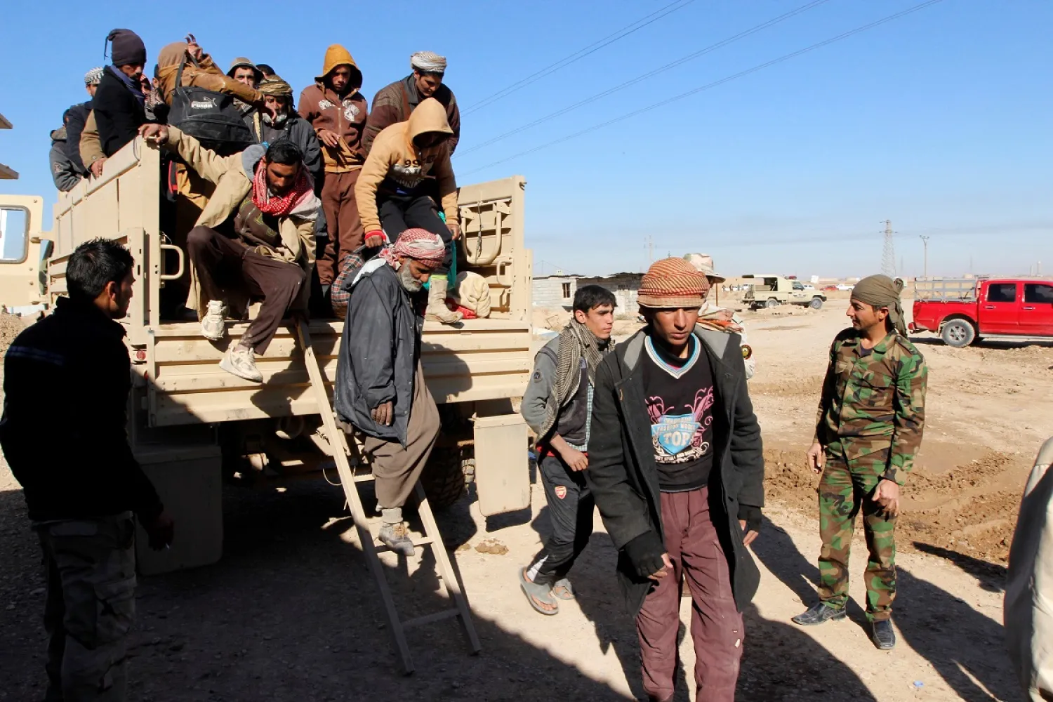  Iraqi displaced people, who fled ISIS militants, arrive in Kirkuk to be transported to camps. REUTERS/Ako Rasheed